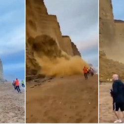 Potężny klif osunął się nad morzem. Grupa turystów uciekła z plaży